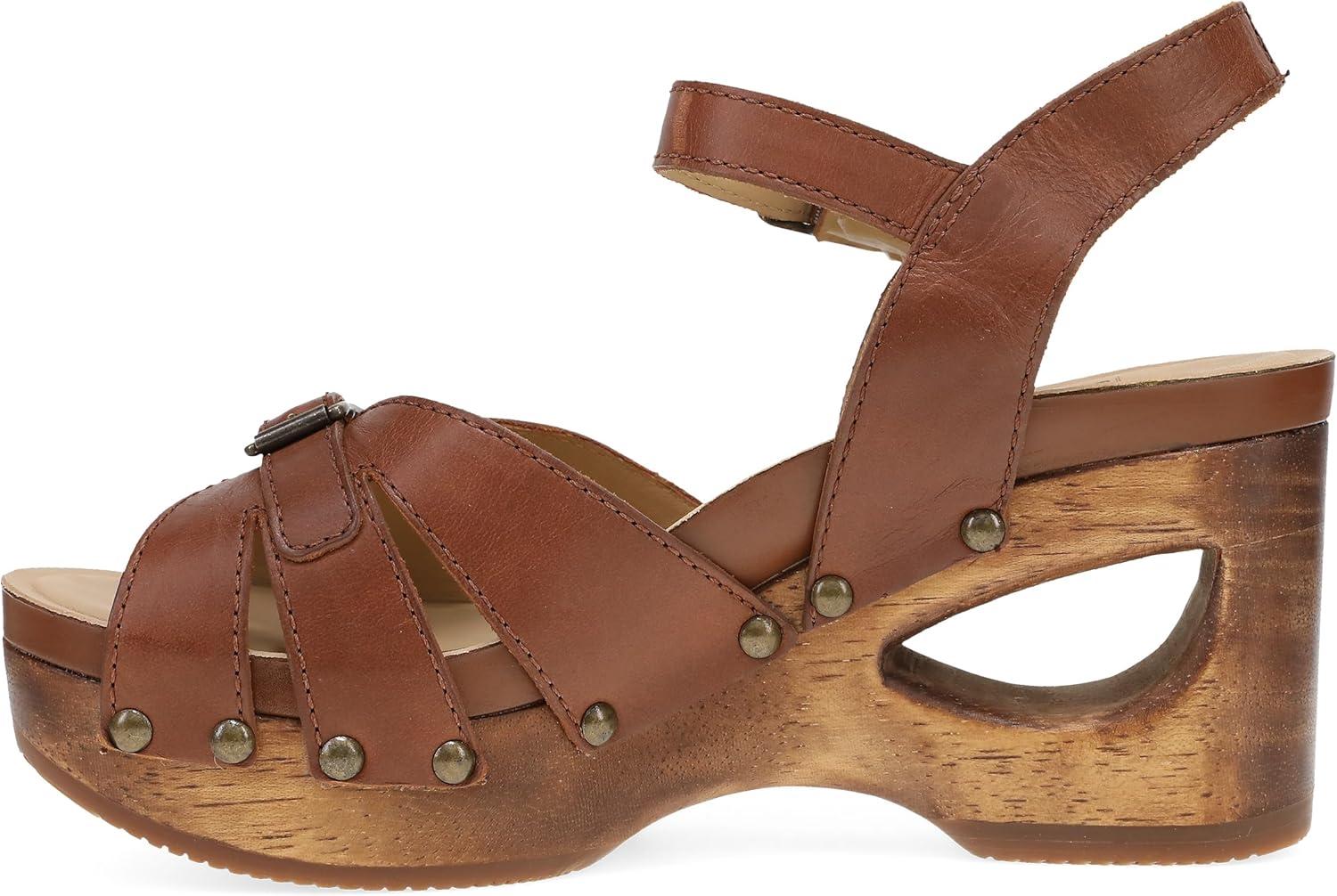 imageDansko Adie Heeled Gladiator Sandal for Women HandCrafted Wooden Outsoles Memory Foam Footbeds and Rubber Padding for Unparalleled Comfort and DurabilityTan