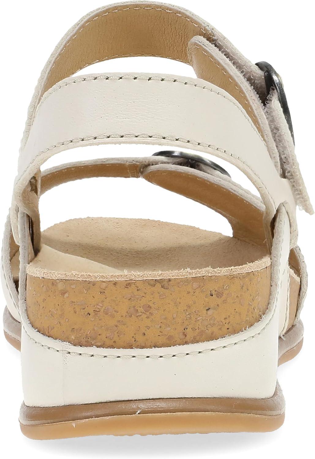 imageDansko Candace Wedge Sandal for Women Comfortable Wedge with Arch Support Fully Adjustable StrapsVersatile Casual to Dressy Footwear Lightweight Rubber OutsoleIvory