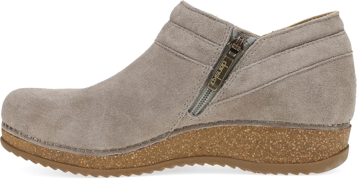 imageDansko Muriel Womens Quilted Suede Ankle Bootie Cozy SlipOn Boot with Cushioned Cork Midsole and Lightweight Rubber OutsoleTaupe