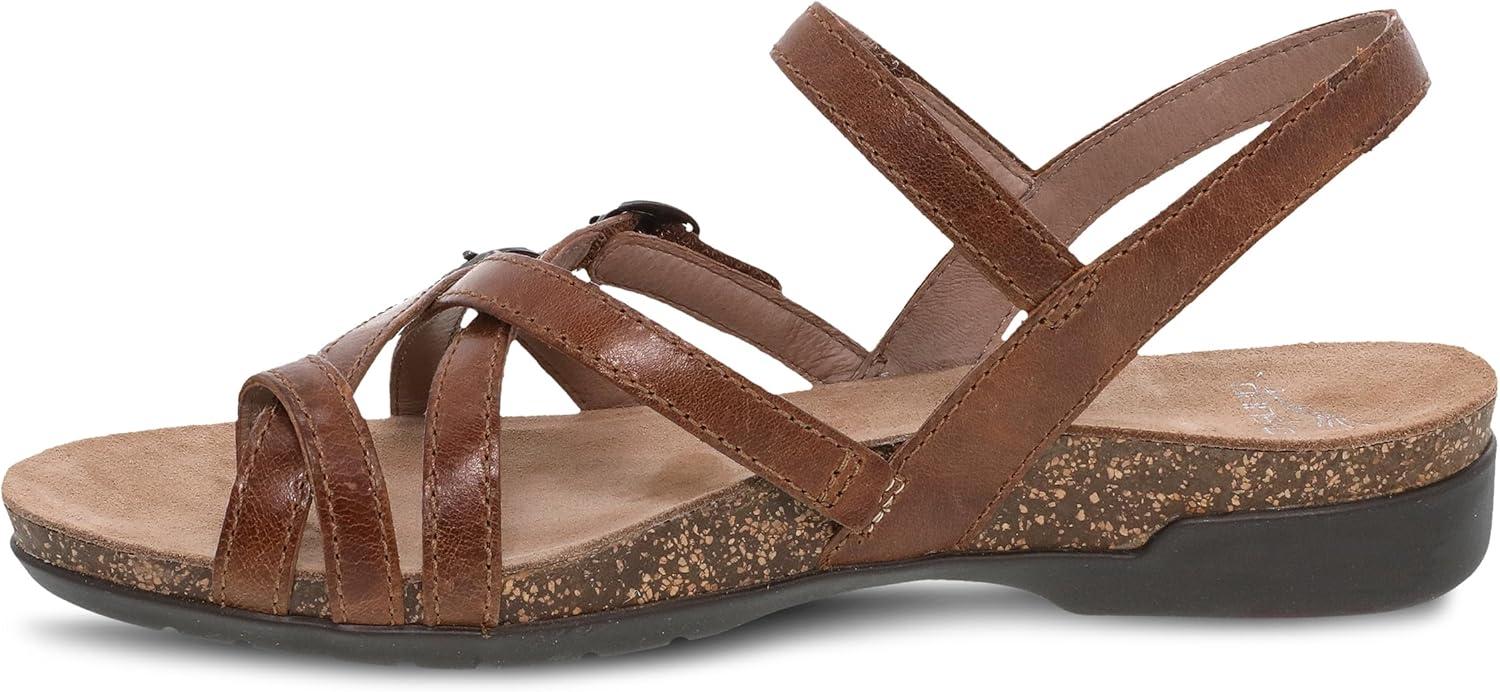 imageDansko Roslyn Sandal for Women  Memory Foam and Cork Footbed for Comfort and Arch Support  Lightweight Rubber Outsole for LongLasting Wear Versatile Casual to Dressy FootwearTan