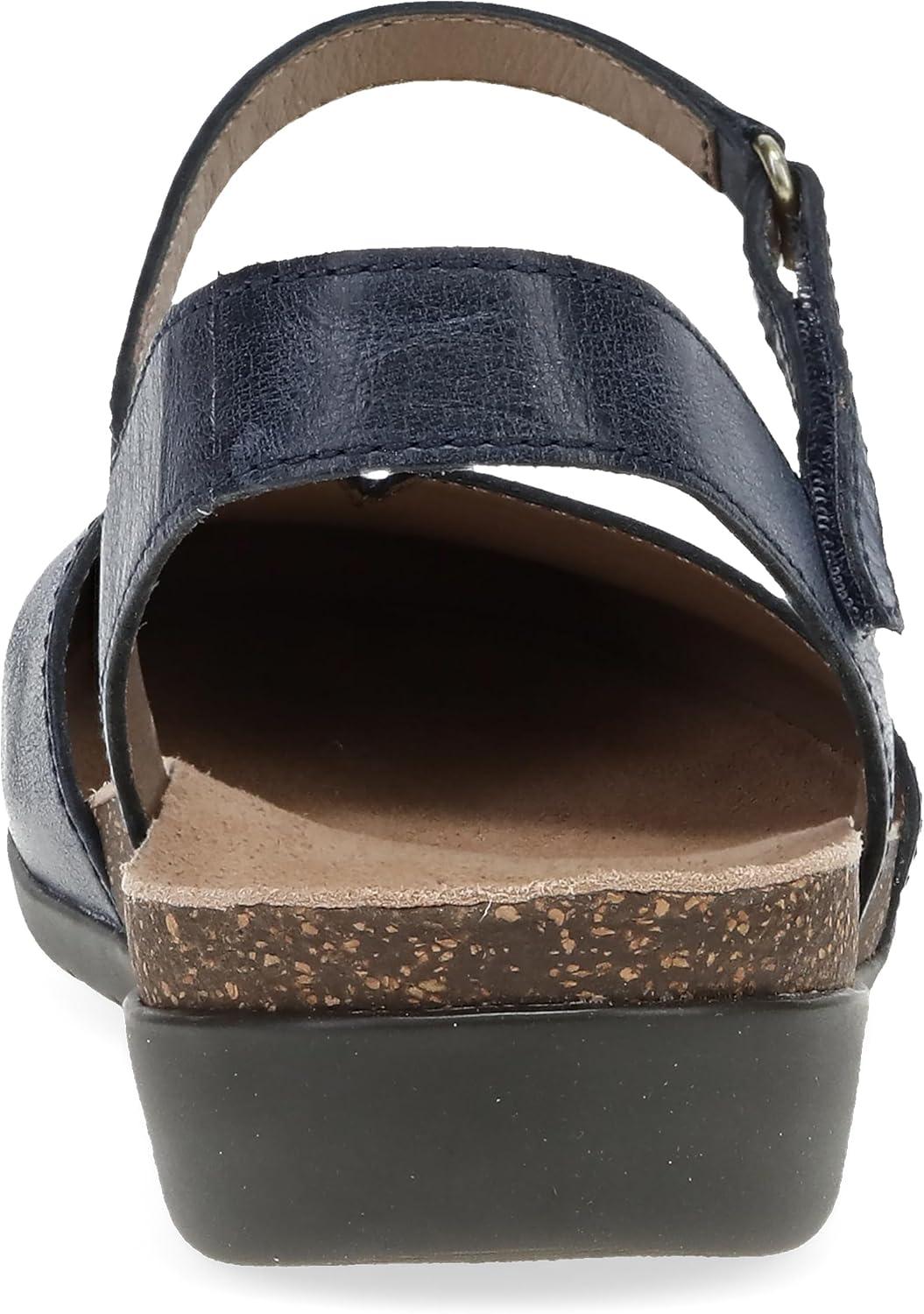 imageDansko Rowan Sandal for Women Memory Foam and Cork Footbed for Comfort and Arch Support Lightweight Rubber Outsole for LongLasting Wear Versatile Casual to Dressy FootwearNavy Waxy